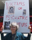 Molly Hogan supporting victims of psychiatric torture.