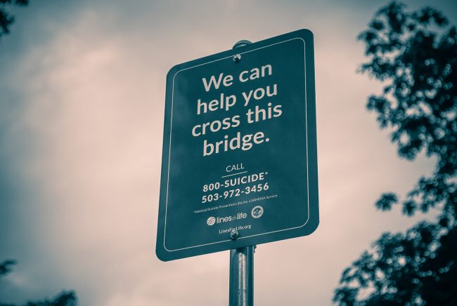Suicide LifeLine/hotline Sign At The Vista Bridge In Portland, Oregon.